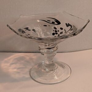 This vintage glass pedestal dish is likely a compote. Black And White Decor